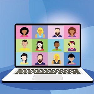 Illustration of a laptop computer showing people in an online meeting.